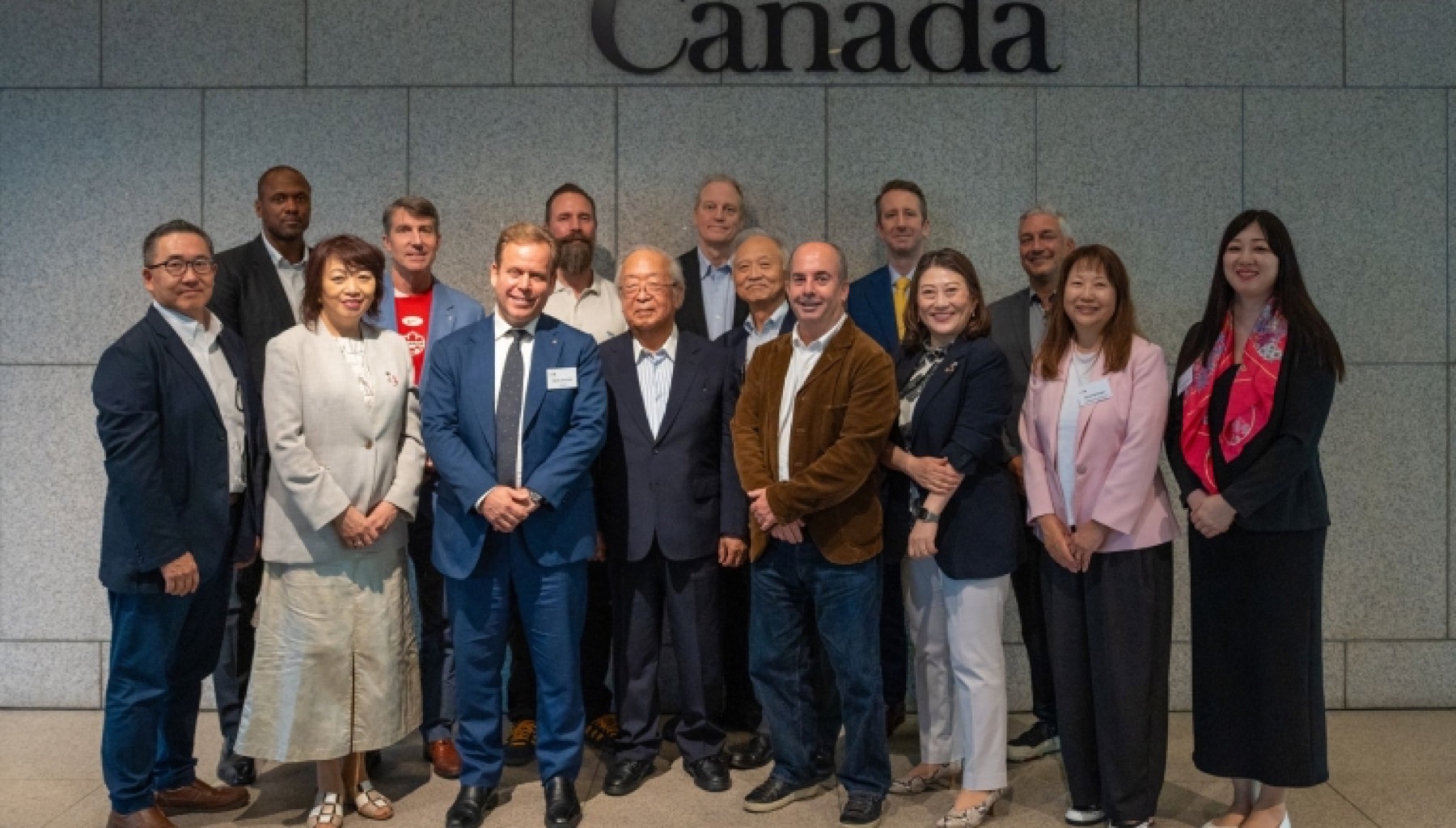 Members of the CCCJ gathered under the Canada wordmark at the Embassy of Canada to Japan